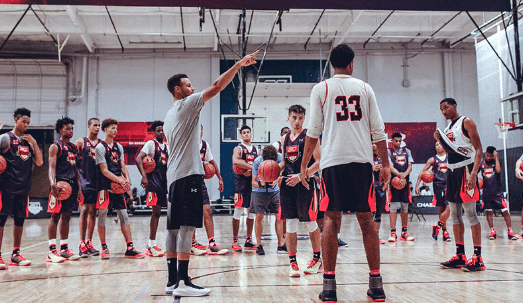 Steph Curry mentoring youth basketball players at SC30 Select Camp